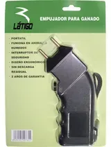 Envase verde para la venta al público de una pistola de juguete eléctrica de plástico negro con texto en español.