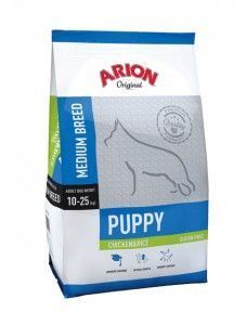 Bolsa de comida para cachorros Arion Original, envase blanco y azul con la silueta de un perro.