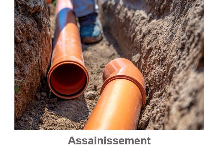 Installation d'un tuyau orange dans le sol