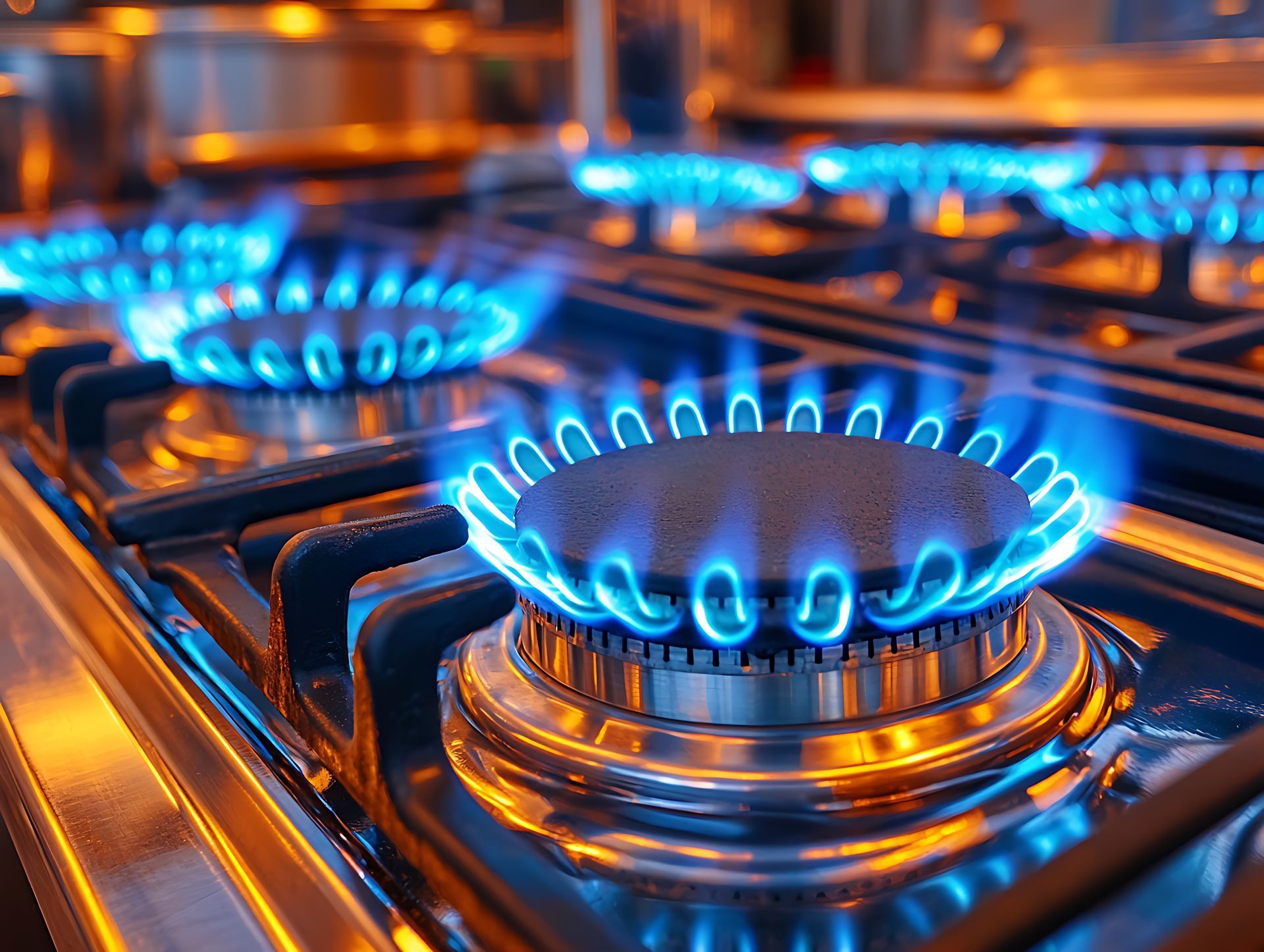 Une plaque de cuisson au gaz en train de chauffer.