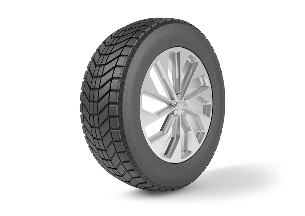 Pneu de voiture à jante argentée, posé sur une surface blanche.