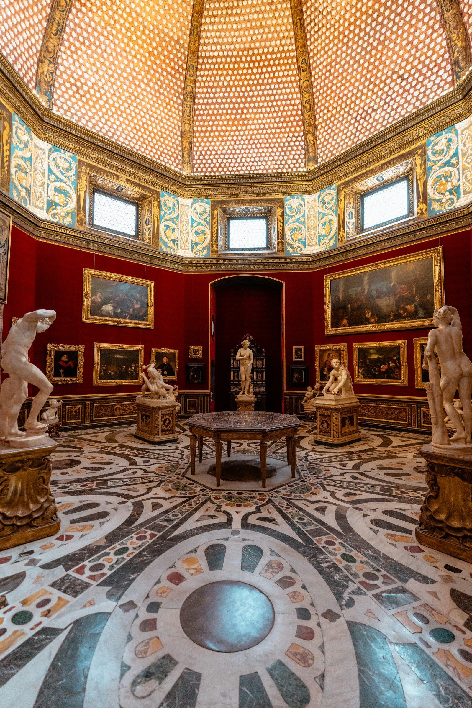 Sculptures and paintings inside the Uffizi Gallery, Florence