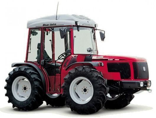 Un tractor rojo con ruedas y neumáticos blancos sobre un fondo blanco.