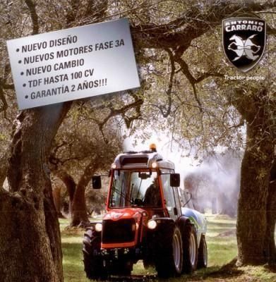 Un tractor con un cartel que dice nuevo diseño.