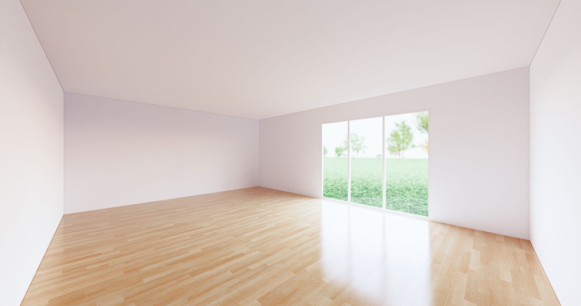 Pièce lumineuse et vide avec parquet clair et grandes portes coulissantes en verre donnant sur la verdure.