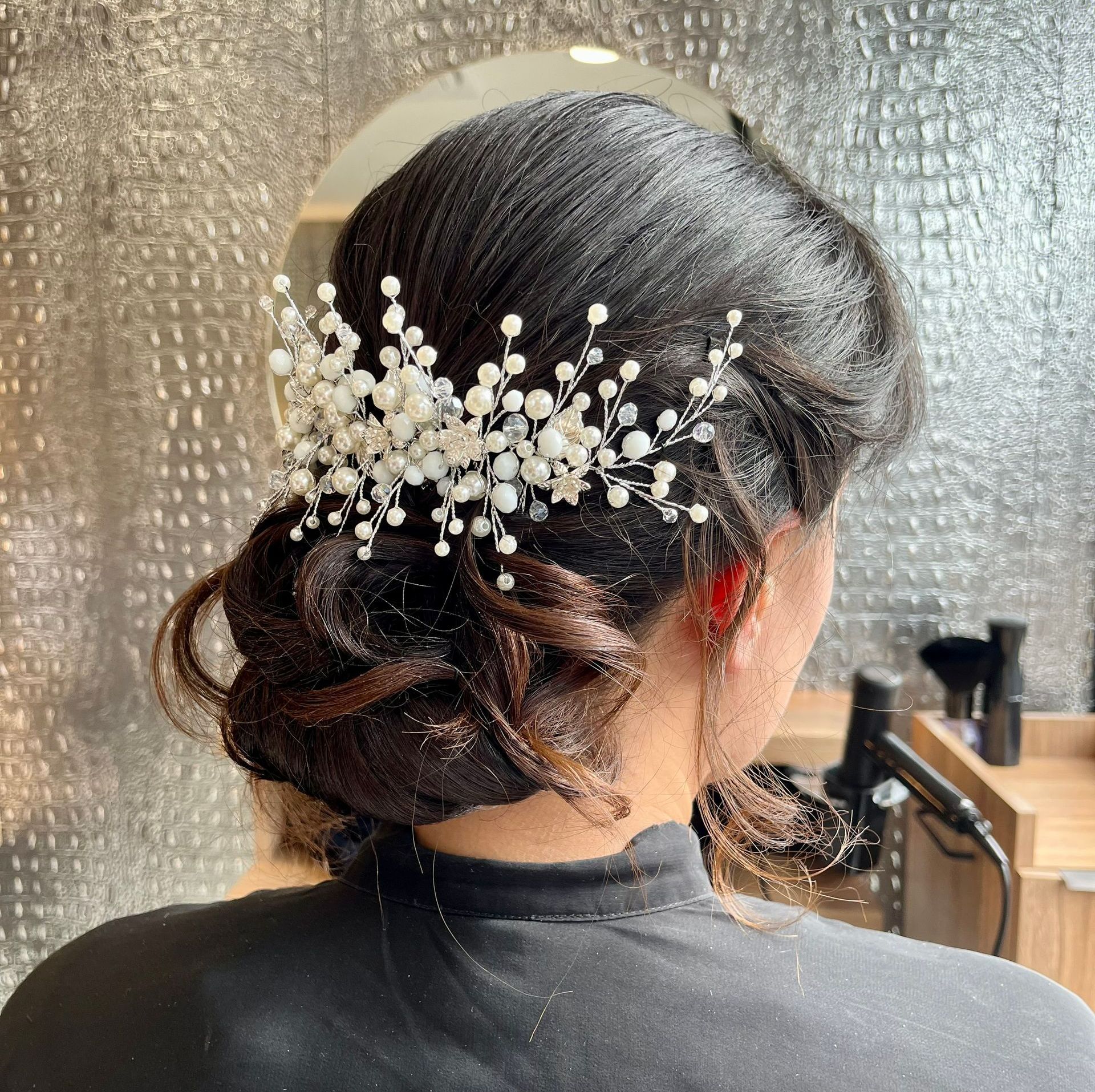 Coiffure de mariage avec chignon bas