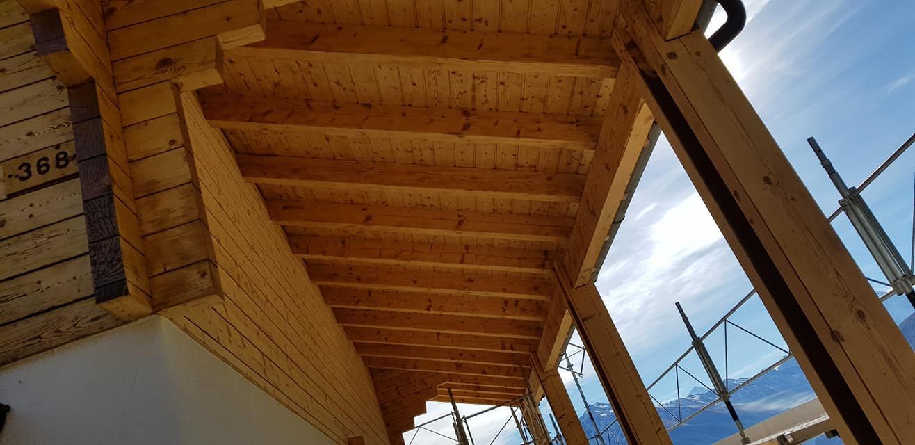 avancée en bois avec poutres