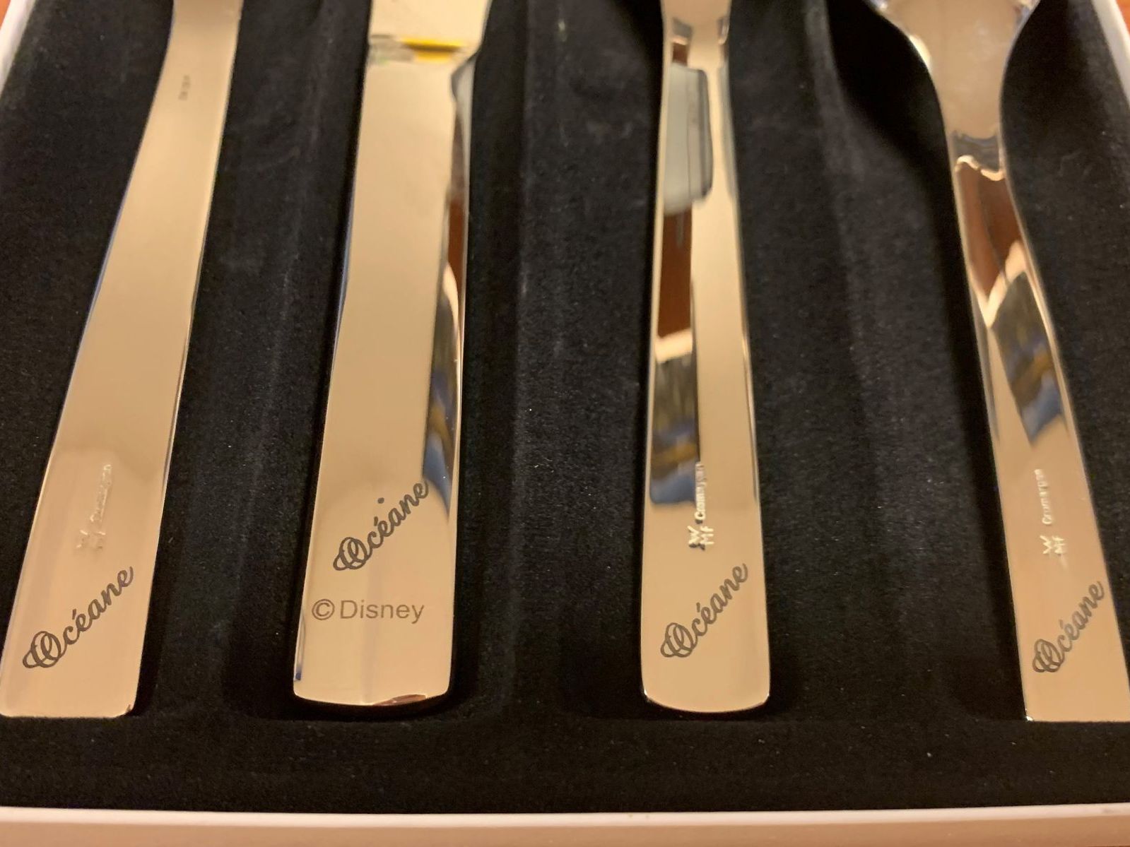 Manches de couverts gravés