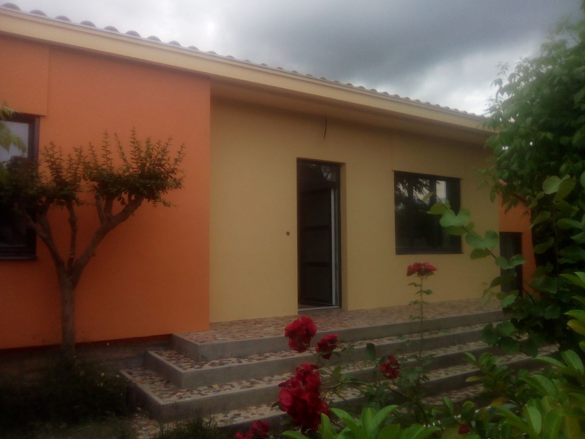 ITE à Quillan d'une maison orange et jaune