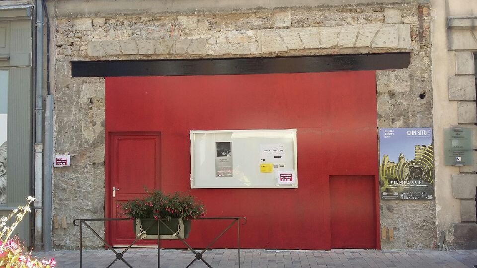 Peinture rouge d'une façade à Carcassonne