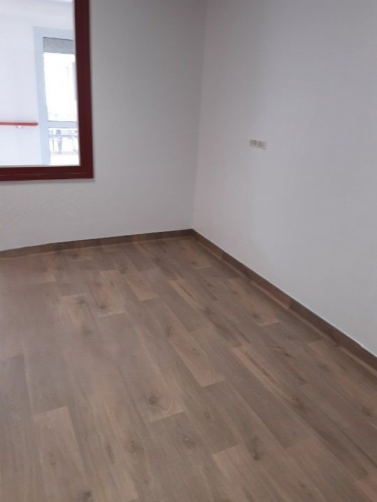 Pose de revêtement parquet dans un appartement