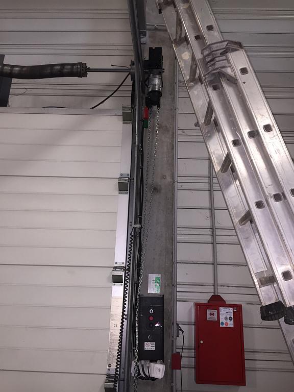 Moteur porte sectionnelle