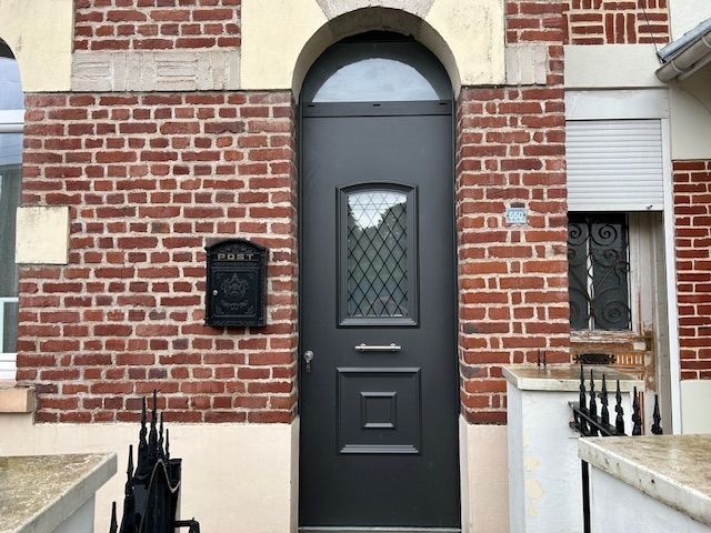 Porte entrée vitrée grise