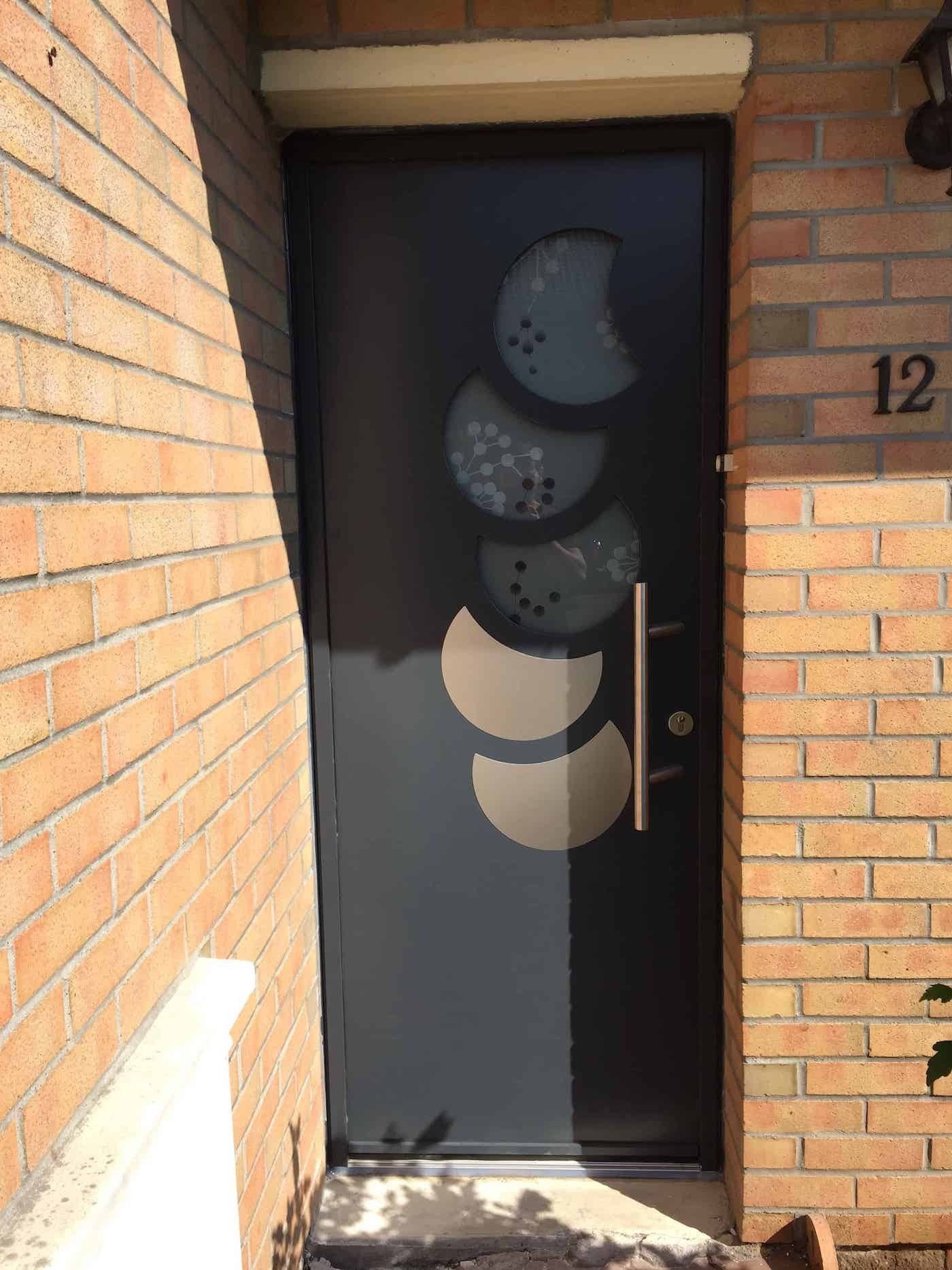 Porte d'entrée vitrages ronds