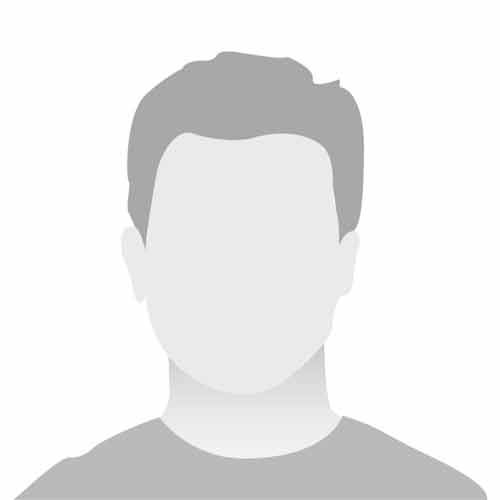Die Silhouette eines Mannes ohne Gesicht auf weißem Hintergrund.