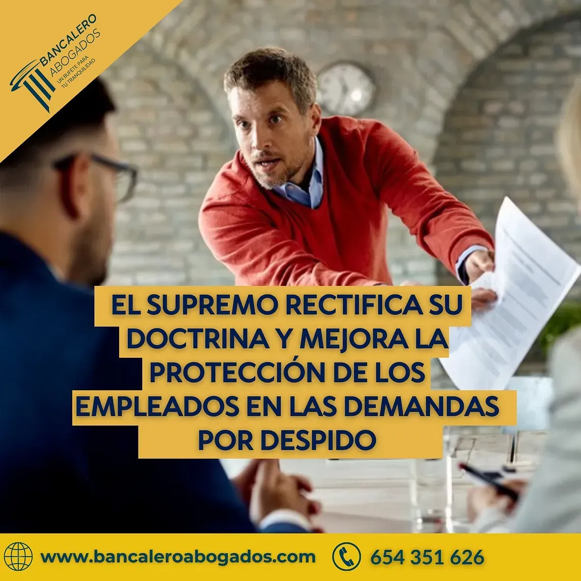 A man in a red sweater is giving a piece of paper to another man
