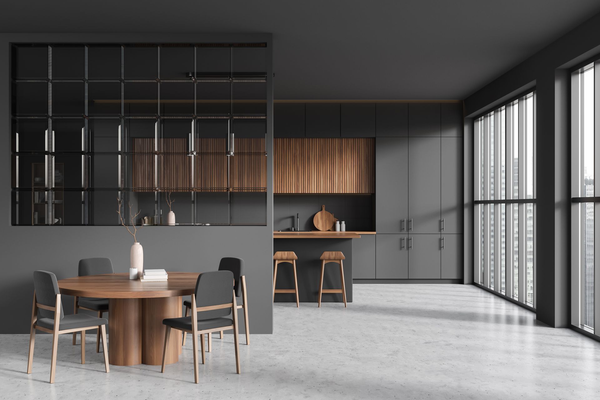 Intérieur moderne comprenant une salle à manger et une cuisine séparée par une cloison avec une verrière.