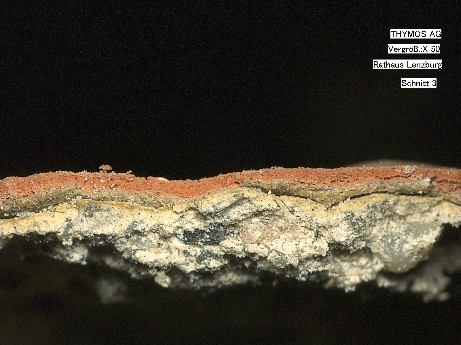 Eine Nahaufnahme eines Betonstücks mit schwarzem Hintergrund