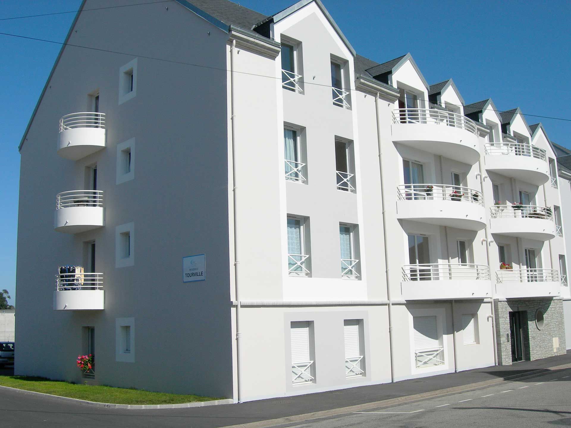 Résidence avec balcons arrondis