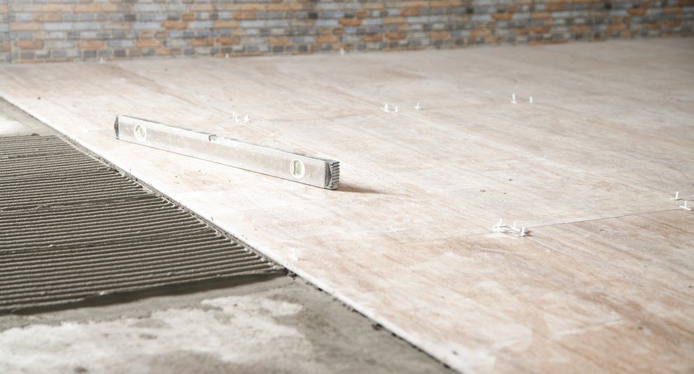 Carrelage intérieur en cours de pose