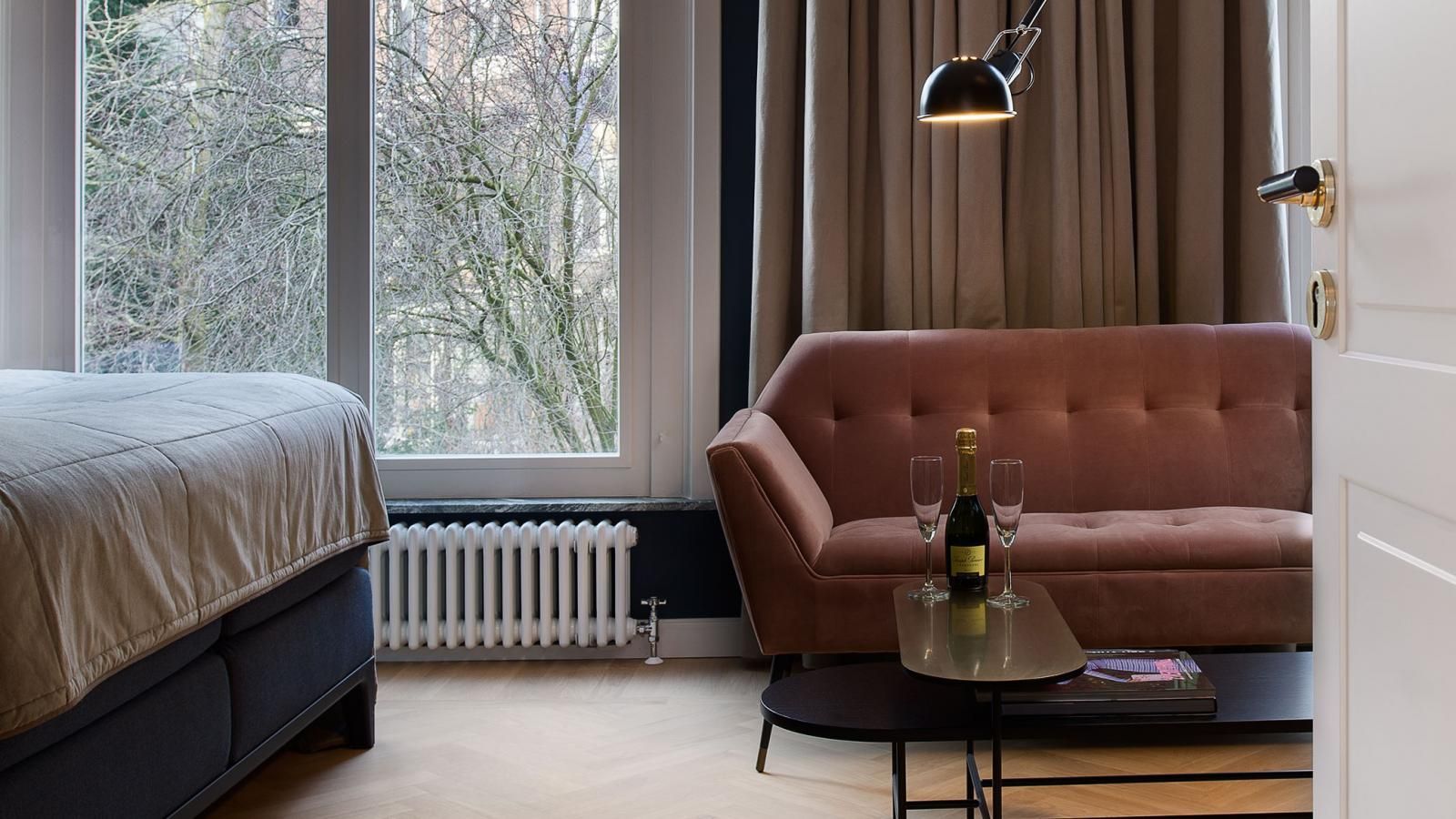 Garden Suite with a couch , table , and window.
