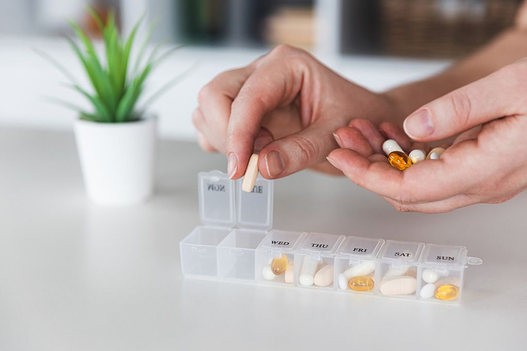 Ajout de médicaments dans un pilulier