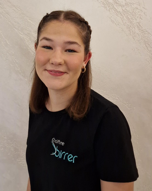 Graue Silhouette einer Person; ein großer Kreis für den Kopf und eine abgerundete Form für den Körper.