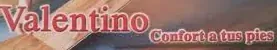Una imagen borrosa de un cartel que dice Valentino.