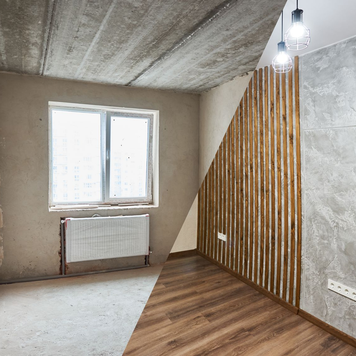 Rénovation de la pièce : moitié brute avec béton, moitié finie avec des accents de bois et de pierre.