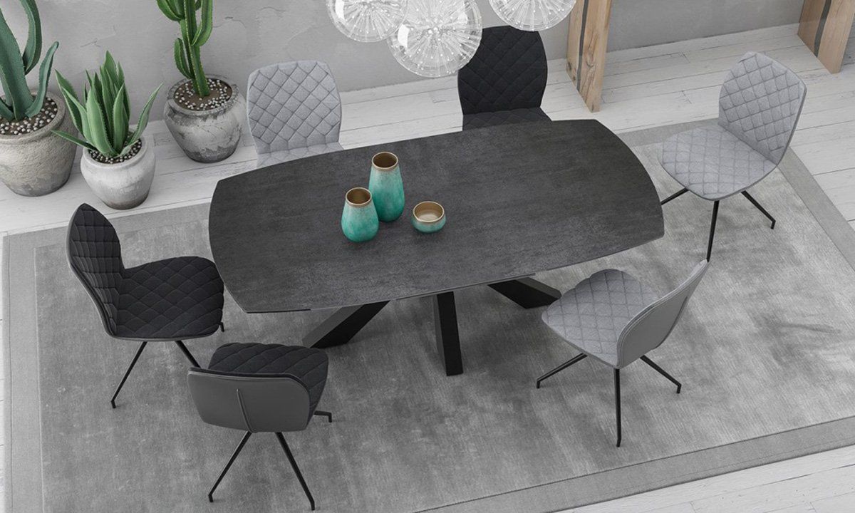 Photo d'usine d'une salle à manger avec une table de repas en céramique effet titane