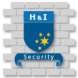 Das Logo von H&I Security befindet sich auf einer Ziegelmauer.