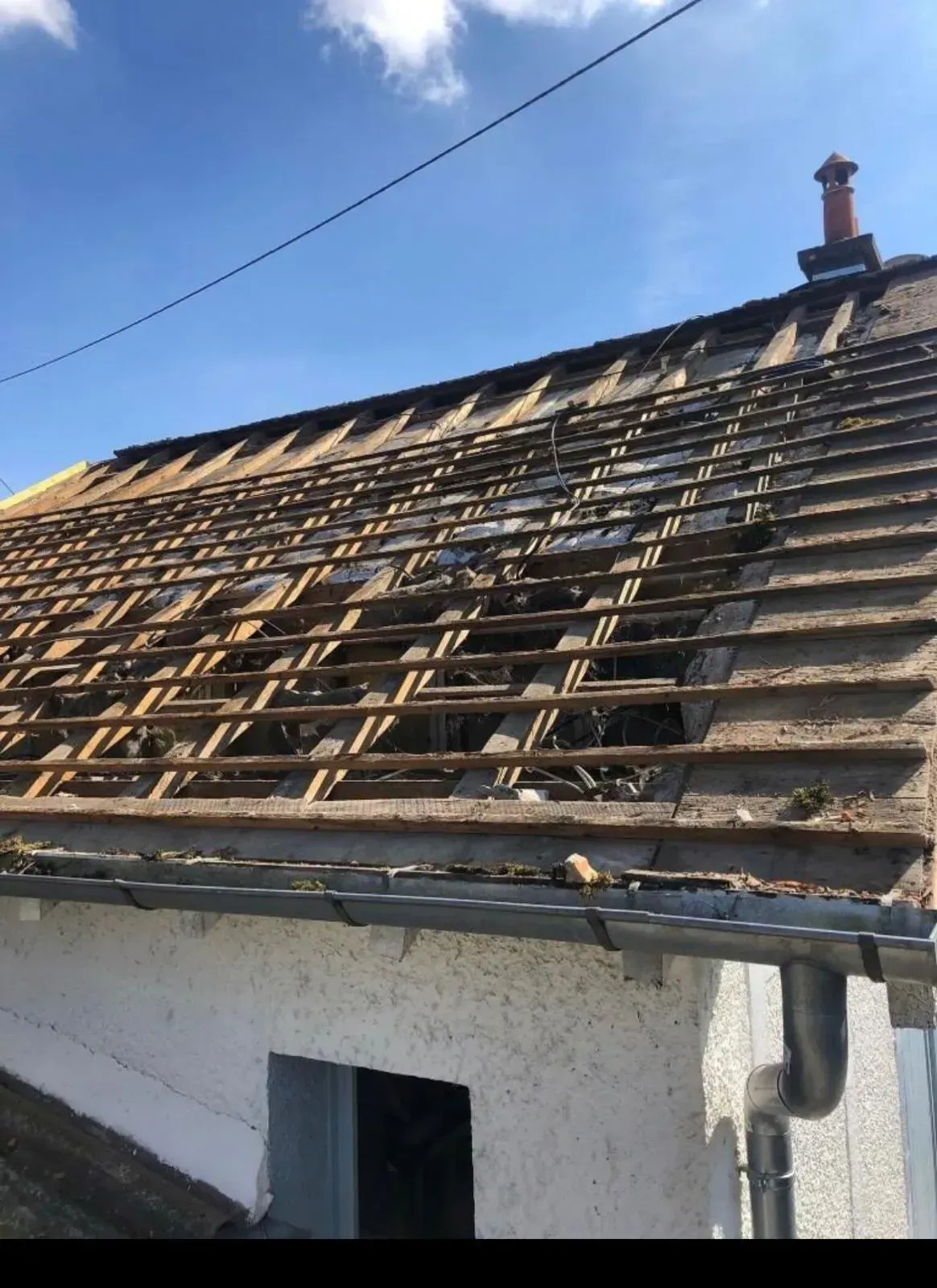 Rénovation de toiture : charpente et couverture.