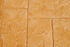 Un primer plano de una pared de ladrillos con un patrón de ladrillos.