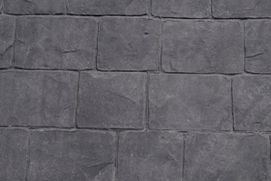 Un primer plano de un piso de baldosas grises.