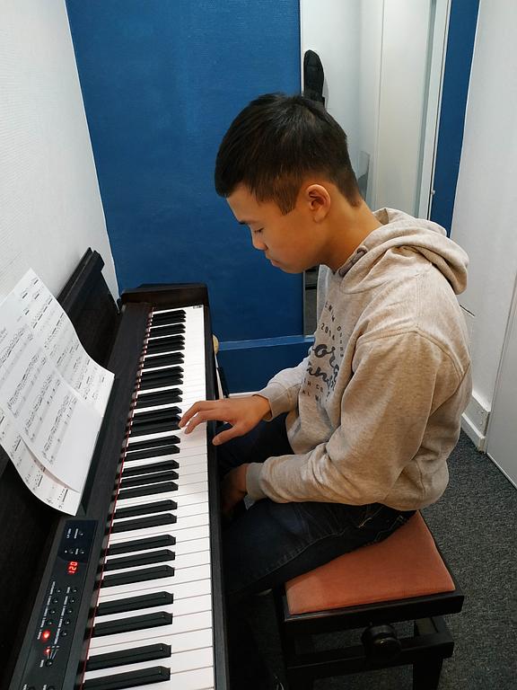 Cours de piano enfant