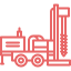 Un dibujo lineal de una máquina con un taladro sobre un fondo blanco.