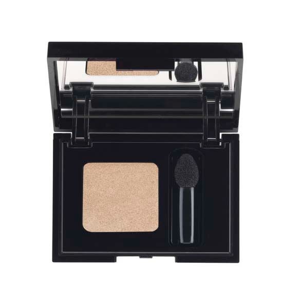 Un recipiente de sombra de ojos con una esponja dentro.