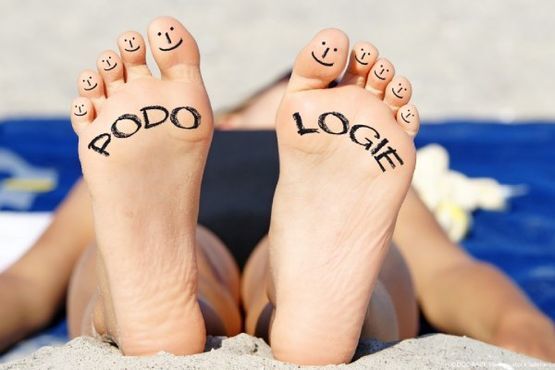Podologie unter Füßen geschrieben