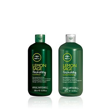 Zwei Flaschen verdickendes Shampoo und Spülung mit Zitronen-Salbei auf einem weißen Hintergrund.
