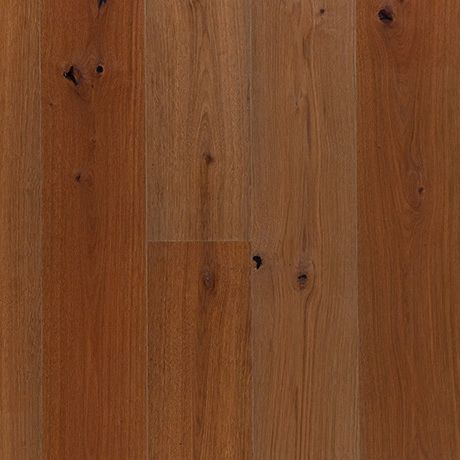 Eine Nahaufnahme eines Holzbodens mit Maserung und Struktur.