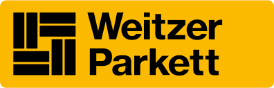 Ein gelbes Schild mit der Aufschrift „Weitzer Parkett“ in schwarzen Buchstaben