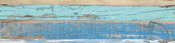 Eine Nahaufnahme einer blauen und braunen Holzoberfläche.