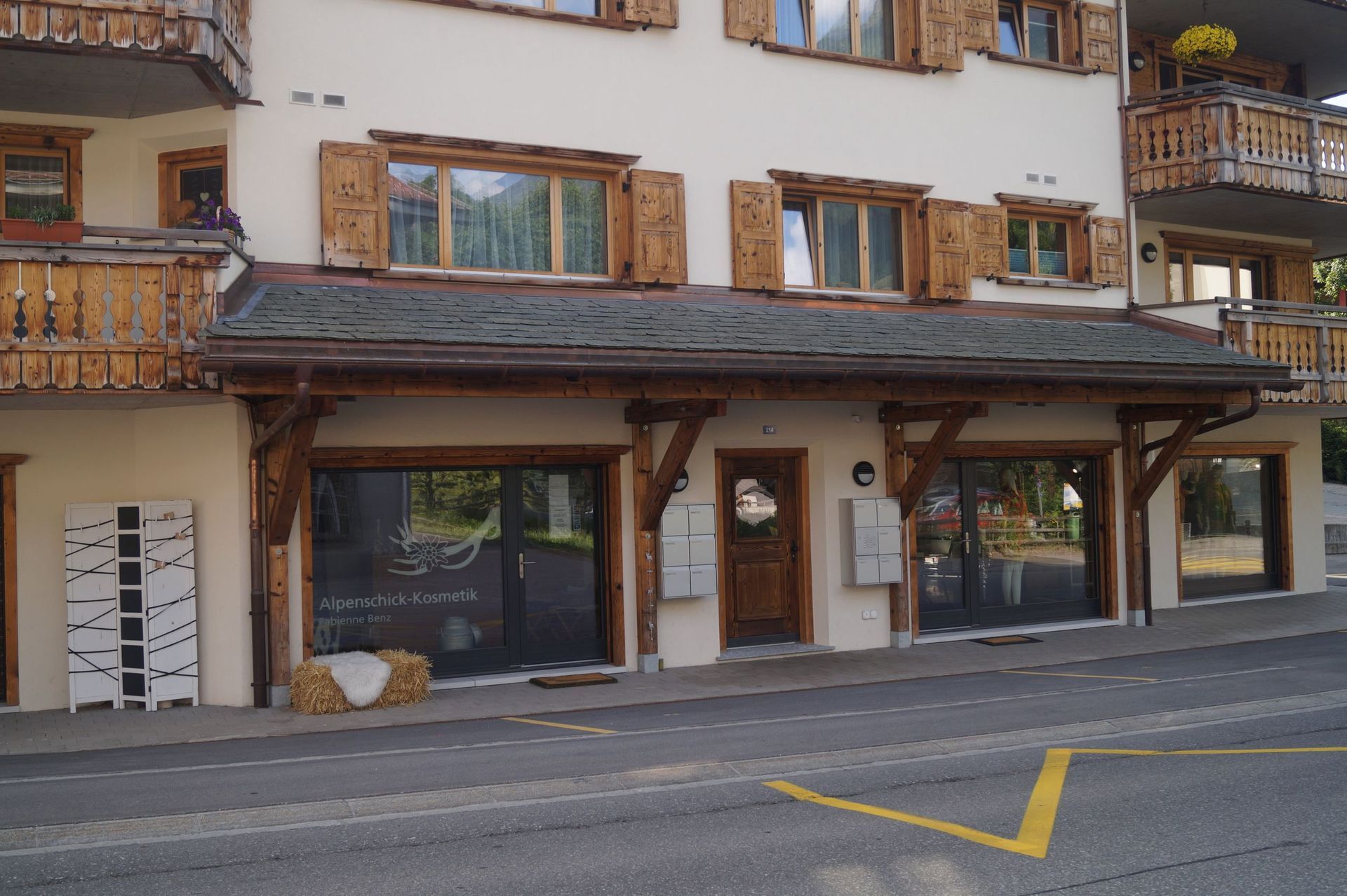 Neubau MFH mit Laden - HoPlan Architektur & Hochbau in Klosters