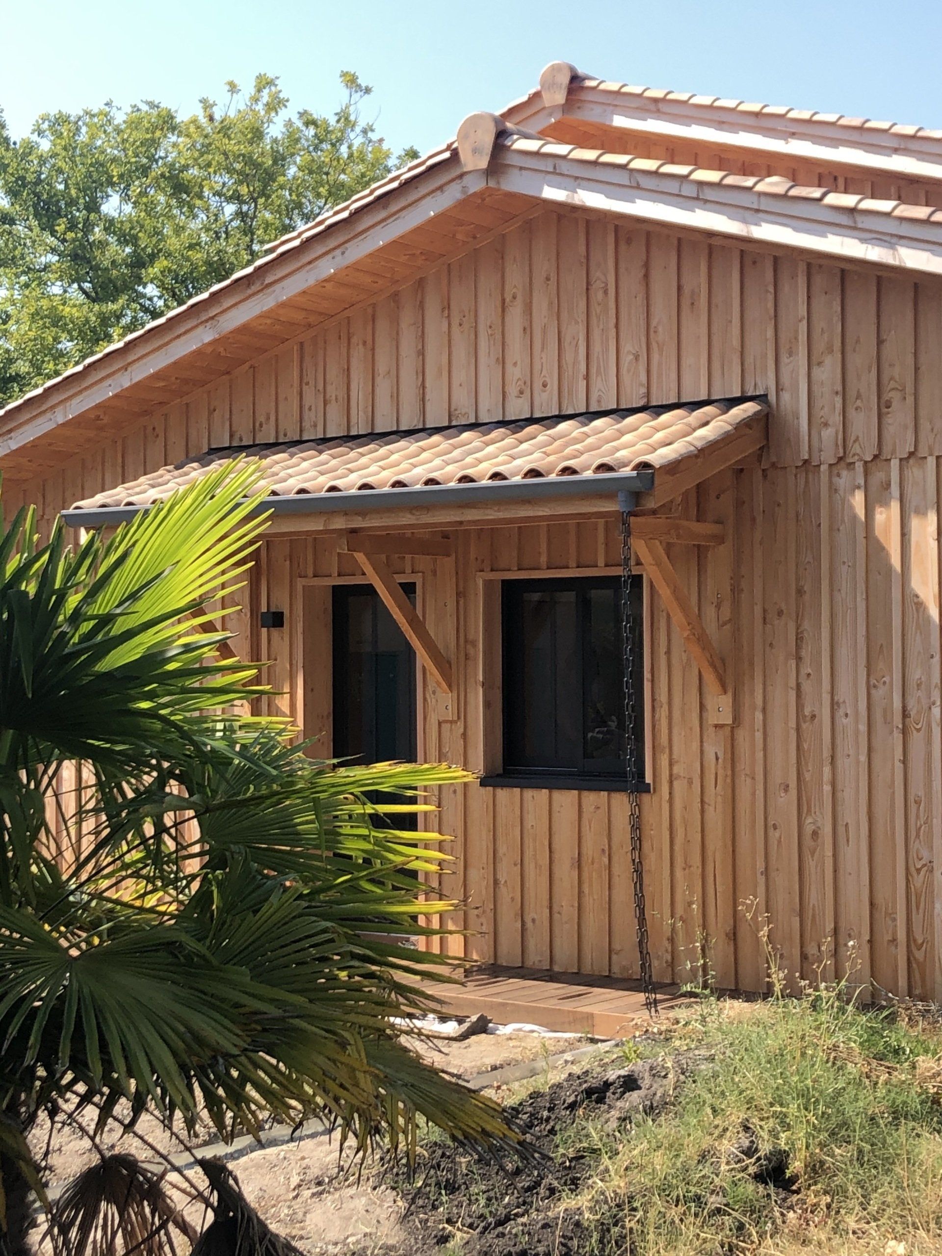 Photo d'une maison en bois.