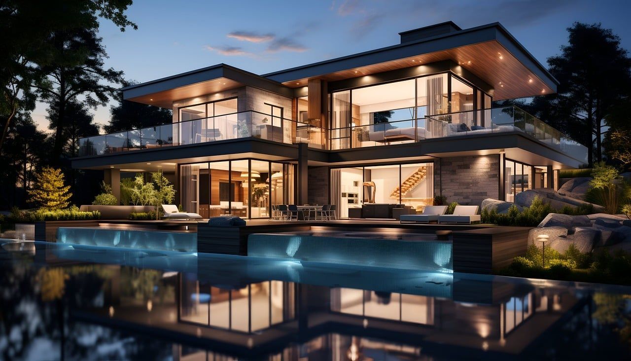 Una casa grande con una piscina frente a ella por la noche.