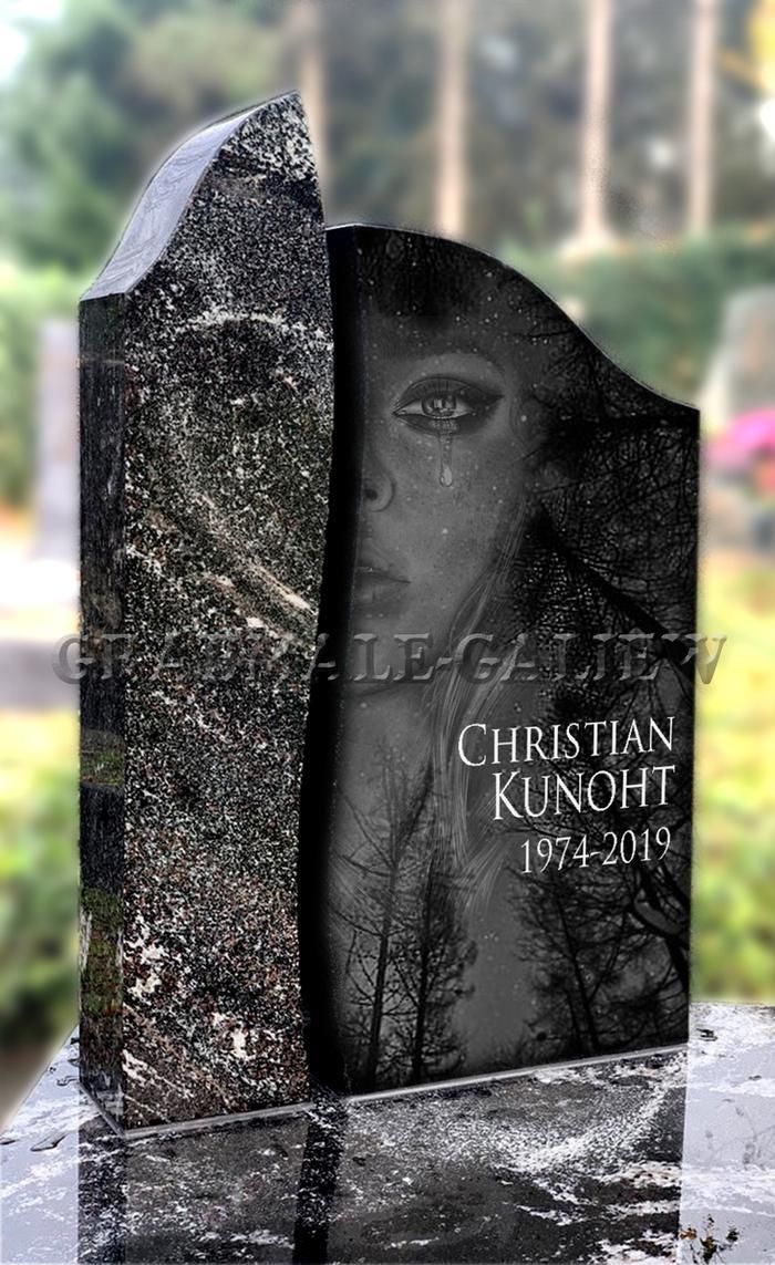 Ein Grabstein mit dem Bild einer Frau darauf