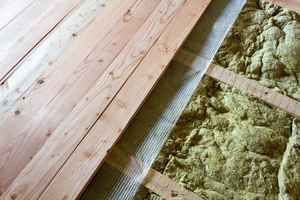 Plancher au-dessus d'une couche de mousse isolante