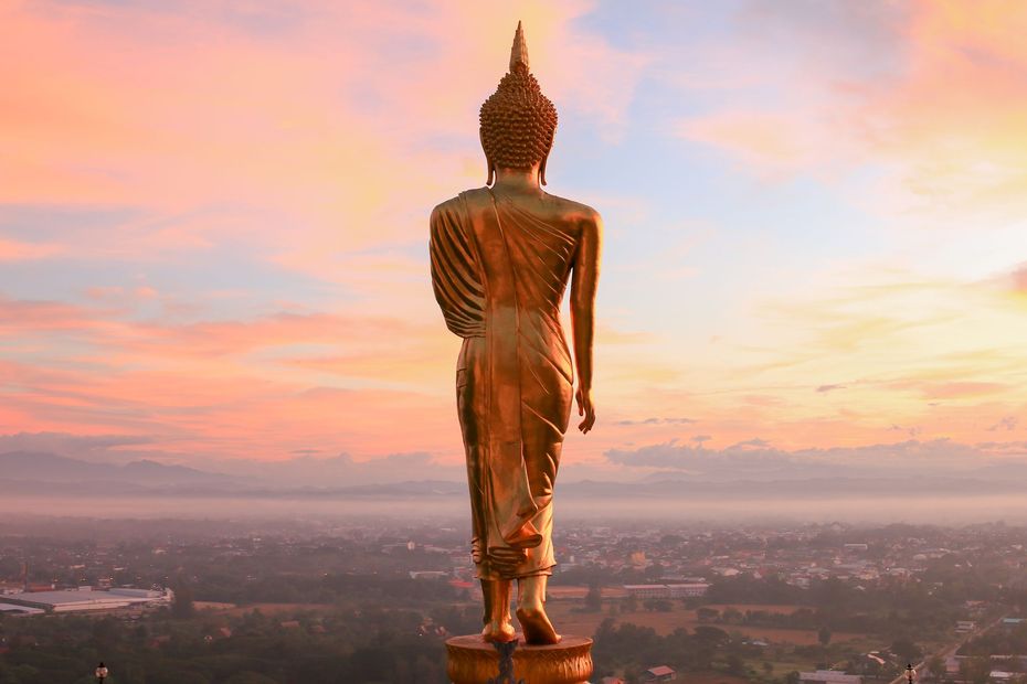 A statue towering over land