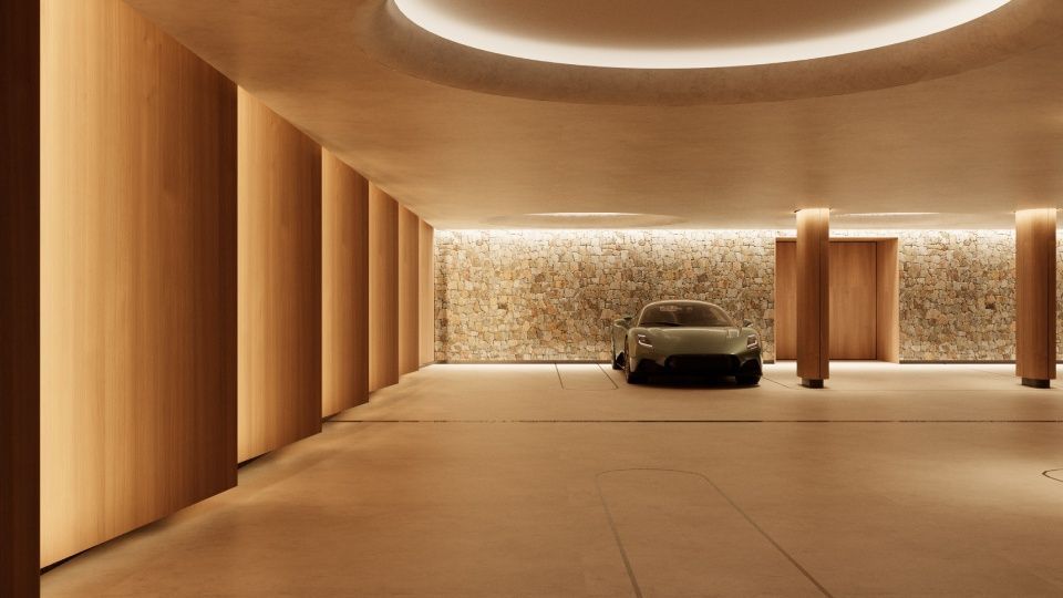 Eine minimalistische, moderne Garage mit strukturierten Steinwänden, warmem Einbaulicht, Holzsäulen und einem Sportwagen.