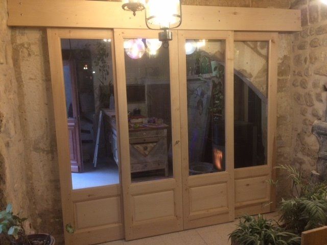 Baie vitrée à 4 vantaux coulissants